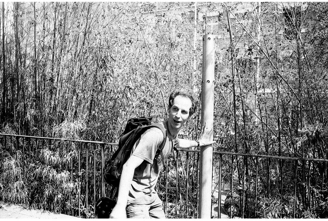 Man by a bamboo thicket